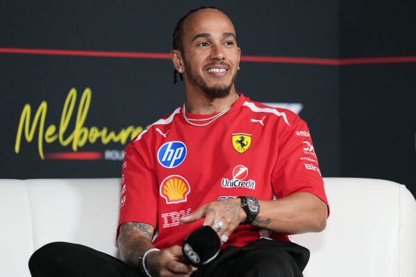 Ferrari's Hamilton vows to stay in F1 until Africa hosts GP