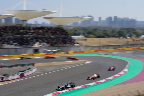 Russell converts sprint pole; Mercedes set Shanghai pace